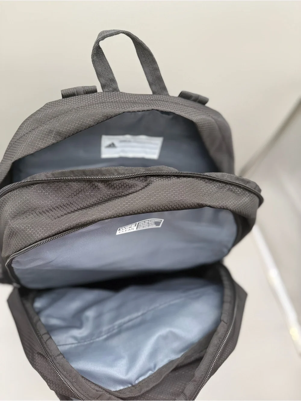 Adidas Black Backpack with Front Organizer and lap top storage.